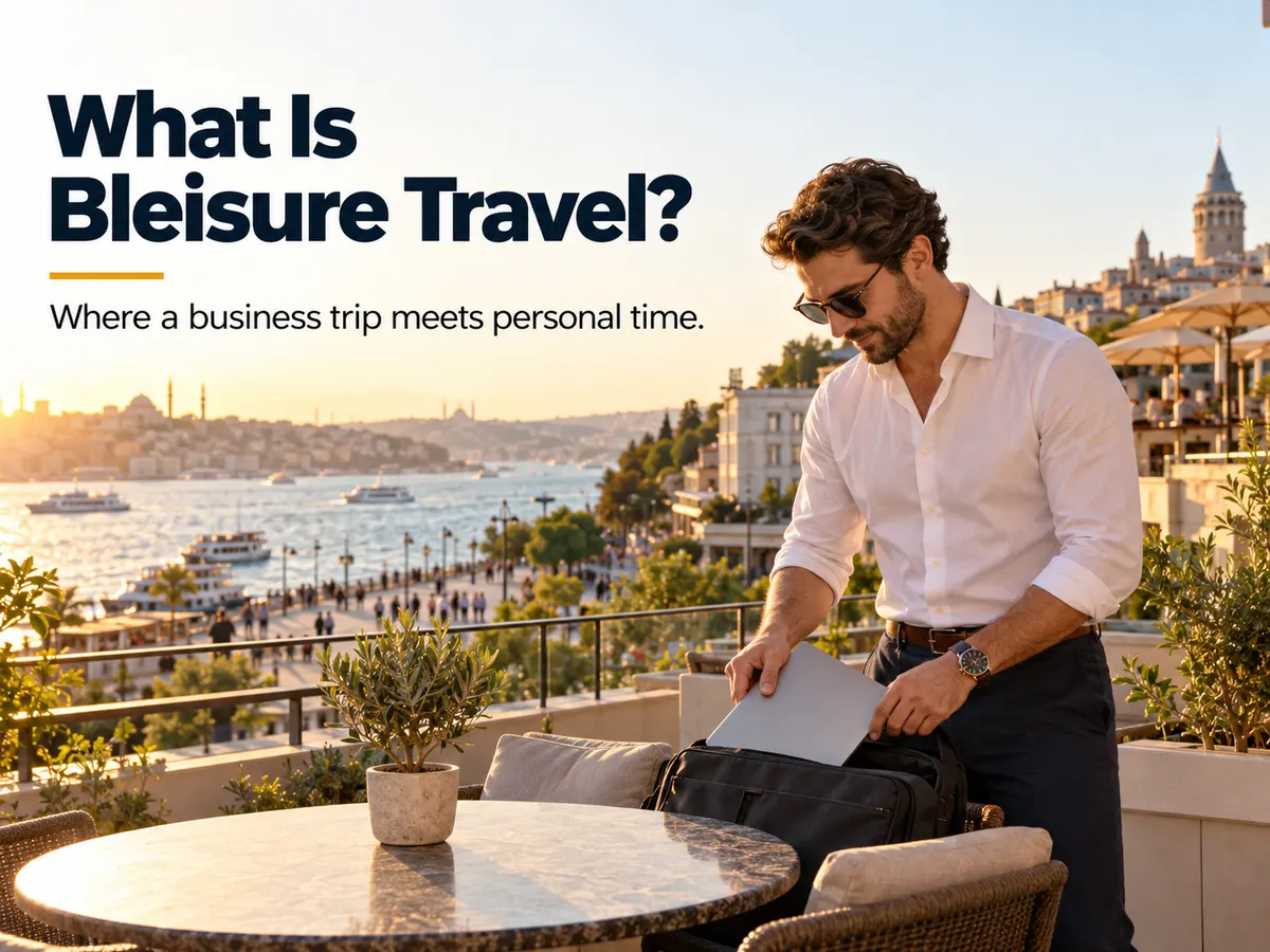 A traveller puts a laptop into a bag on a terrace overlooking a busy waterfront.